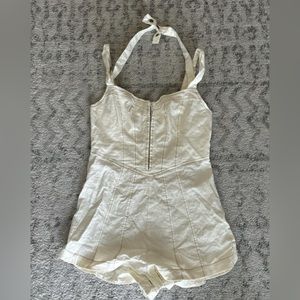 Urban Outfitters Romper 
Super cute 
Medium NWT 
Originally 69 USD plus tax